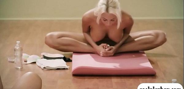  Hot babes and busty trainer doing yoga while all naked